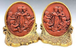 Item #1097 Gold-Finish Ceramic Cameo Bookends. Bookends