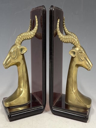 Item #1107 Brass and Plastic Bookends Depicting Antelopes. Bookends